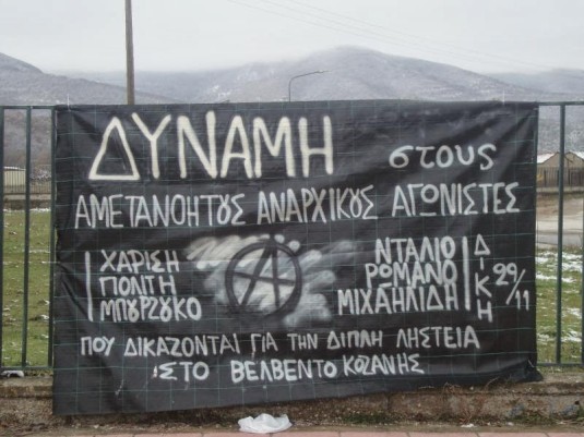 Forza ai combattenti anarchici impenitenti: Harisis, Politis, Bourzoukos, Ntalios, Romanos, Michailidis in giudizio per la doppia rapina al Velventòs di Kozani